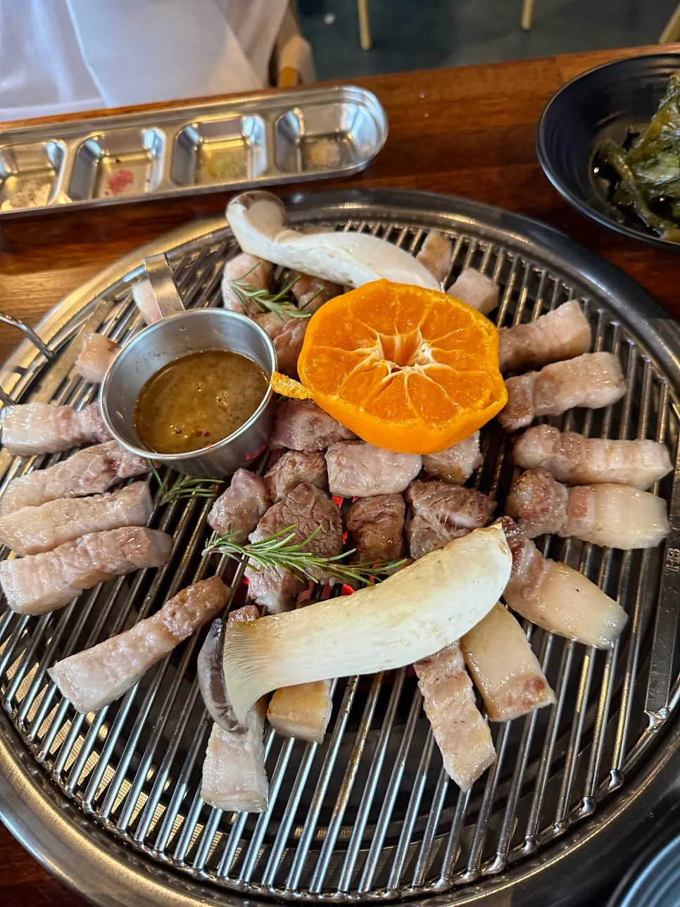 Generously set table of black pork