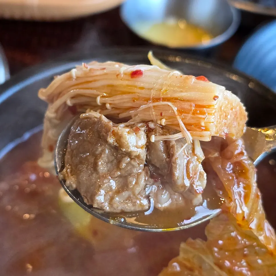 Healing kimchi jjigae with tofu and meat
