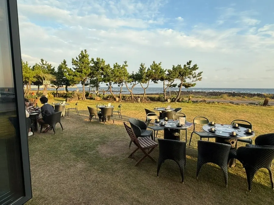 Spacious indoor seating at Jeju Healing Dwaeji