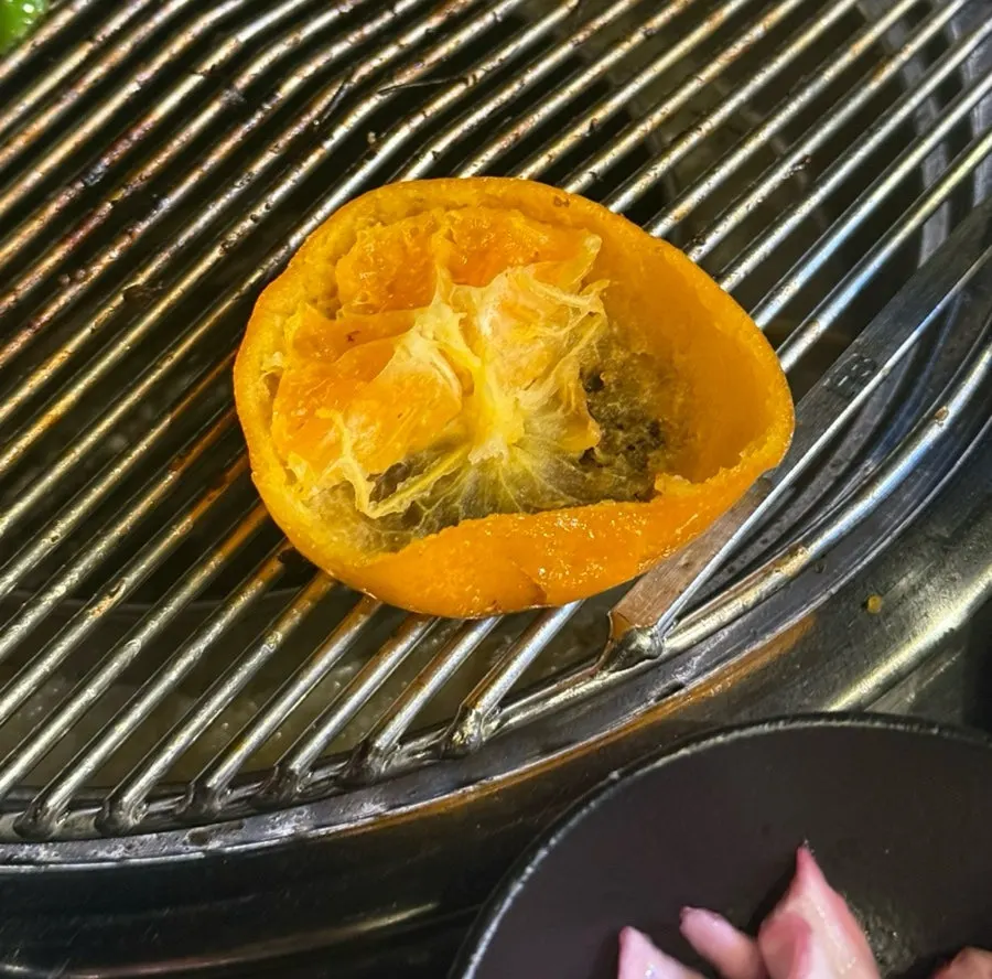 A piece of black pork dipped in melchi-jeot