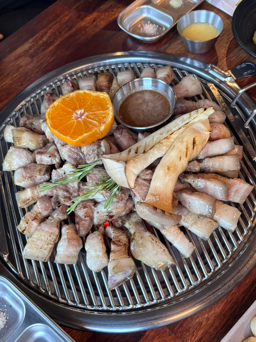 A piece of black pork dipped in salt