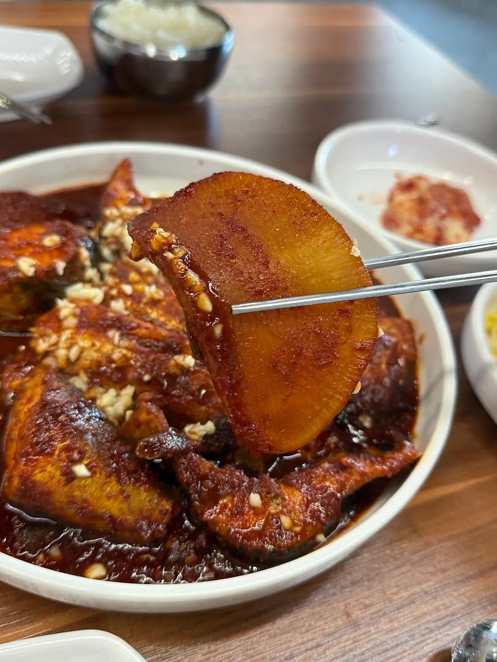 Stew sauce topped with garlic garnish
