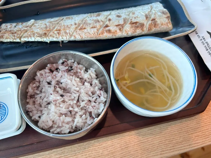 Black rice and bean sprout soup on the table