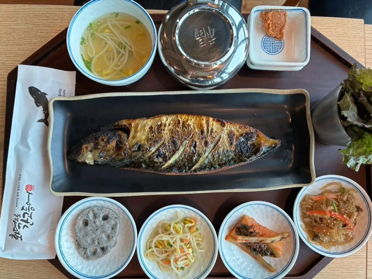 Full spread of the wood-fired mackerel set and Jeju hairtail set