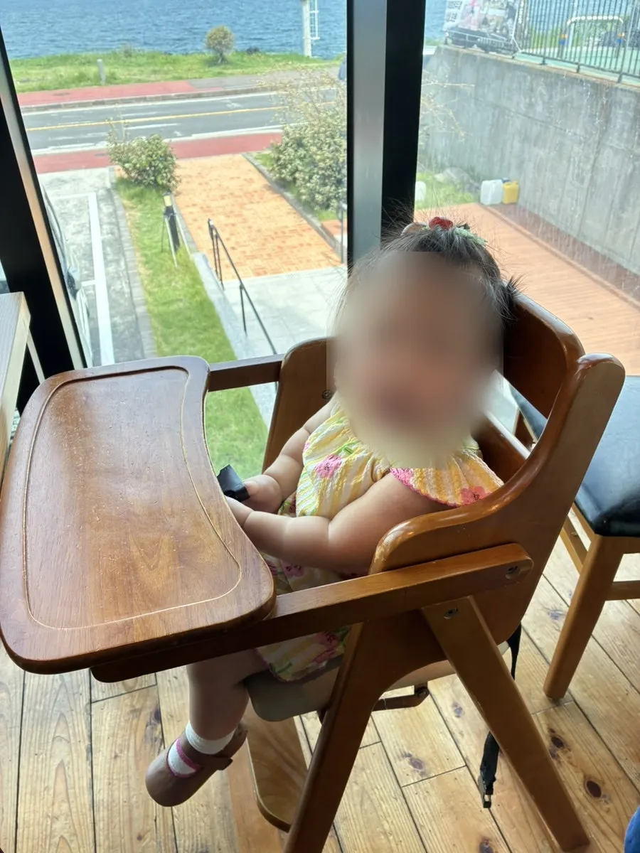 Child eating deboned fish meat