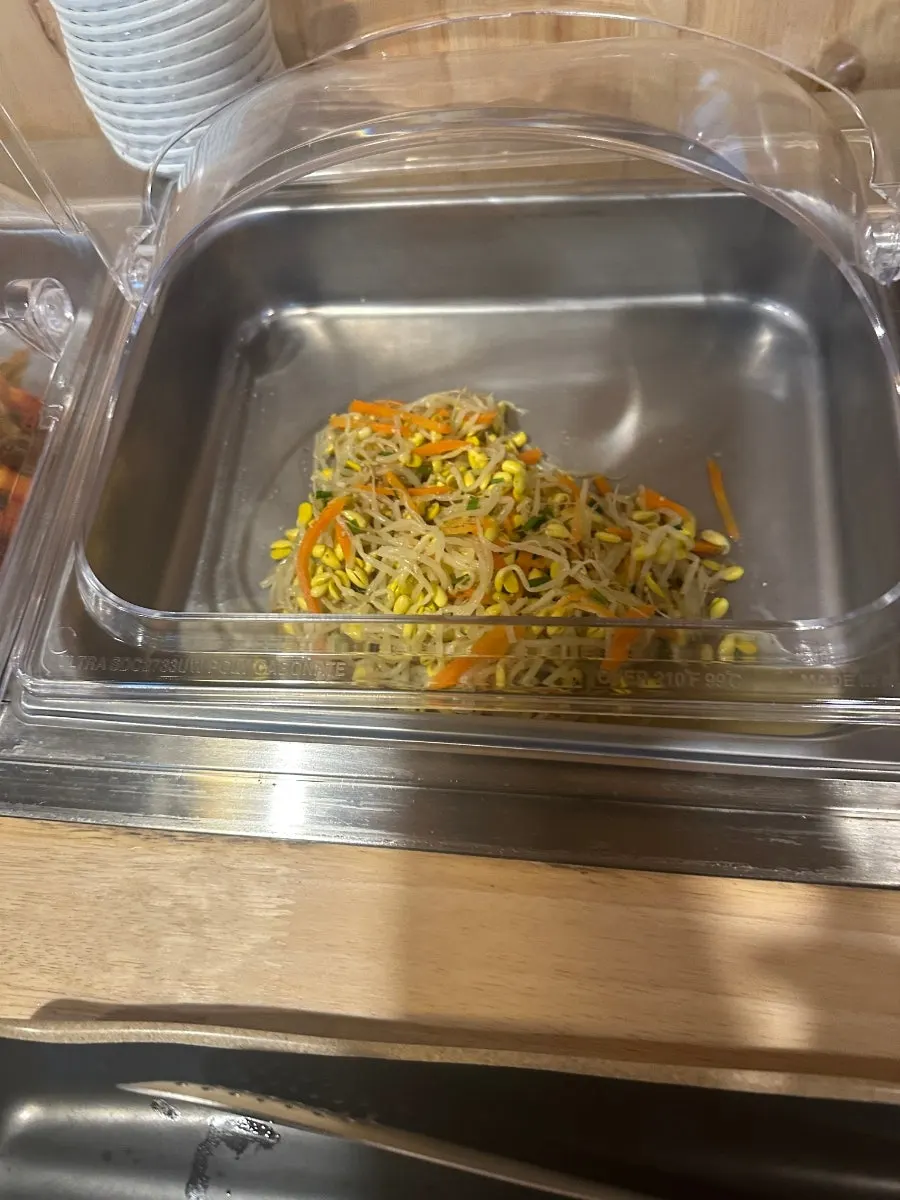 Self-serve tteokbokki with thick sauce and wheat rice cakes