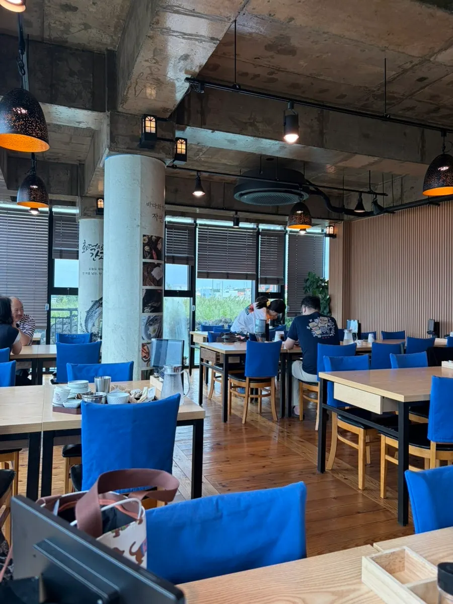 Restaurant interior with a view of Iho Tewoo Beach