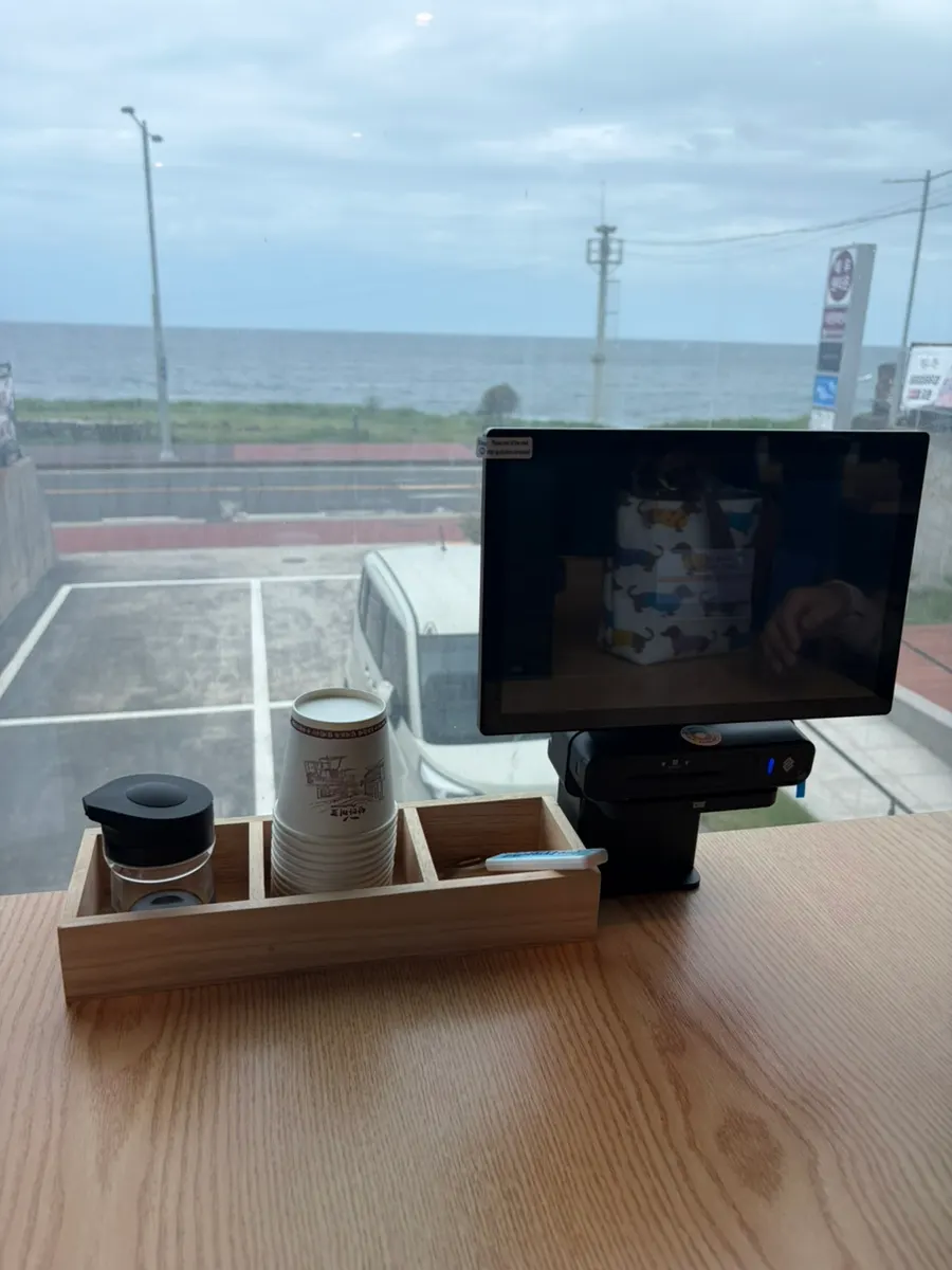 Self-service bar with side dishes and fried eggs