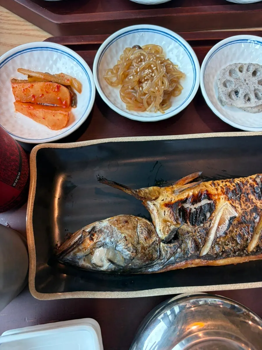Plump wood-fired grilled mackerel with side dishes