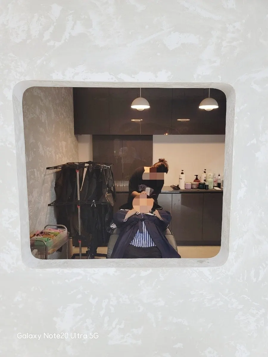 The finished calm, smooth slick cut style