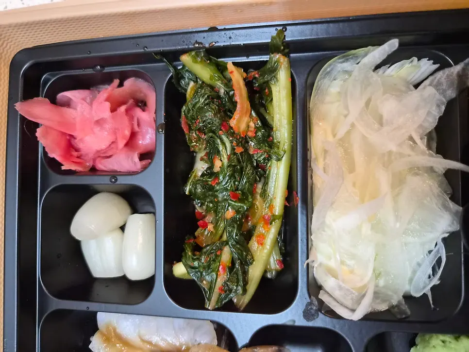 Rice bowl topped with stir-fried baby octopus