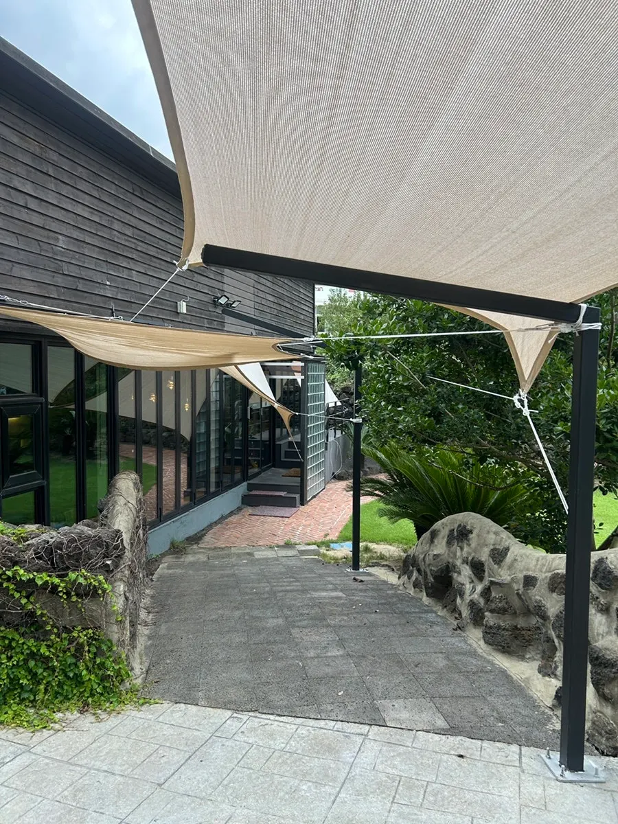 Green yard outside the café’s main building