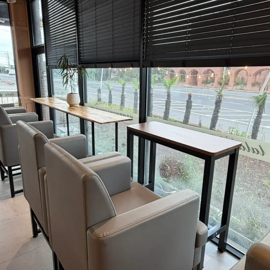 Inside Lala Cafe with wide table spacing