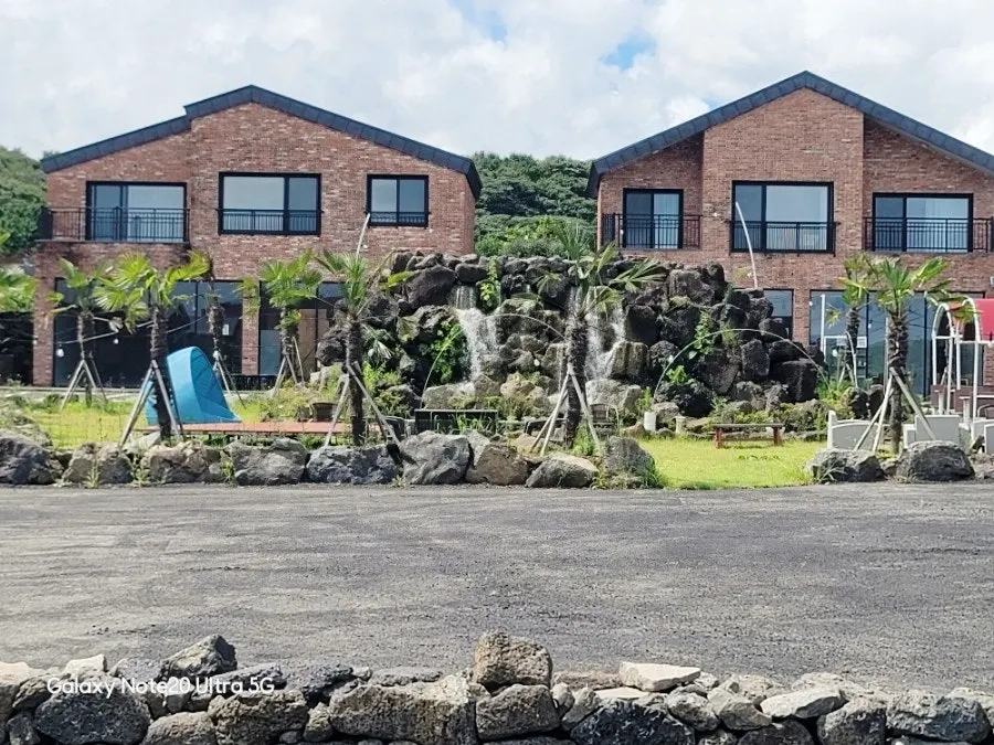 Small waterfall in front of Lala Cafe building