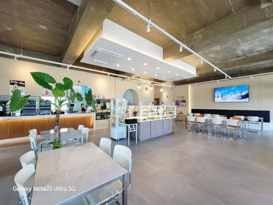Widely spaced tables and chairs at Lala Cafe