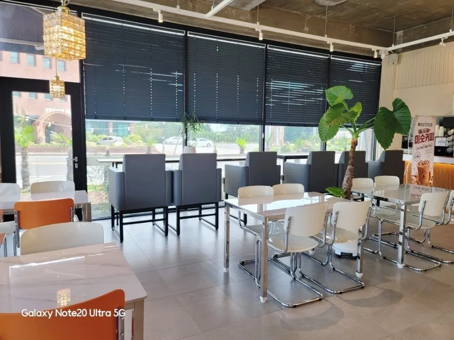 Café seating under warm lighting
