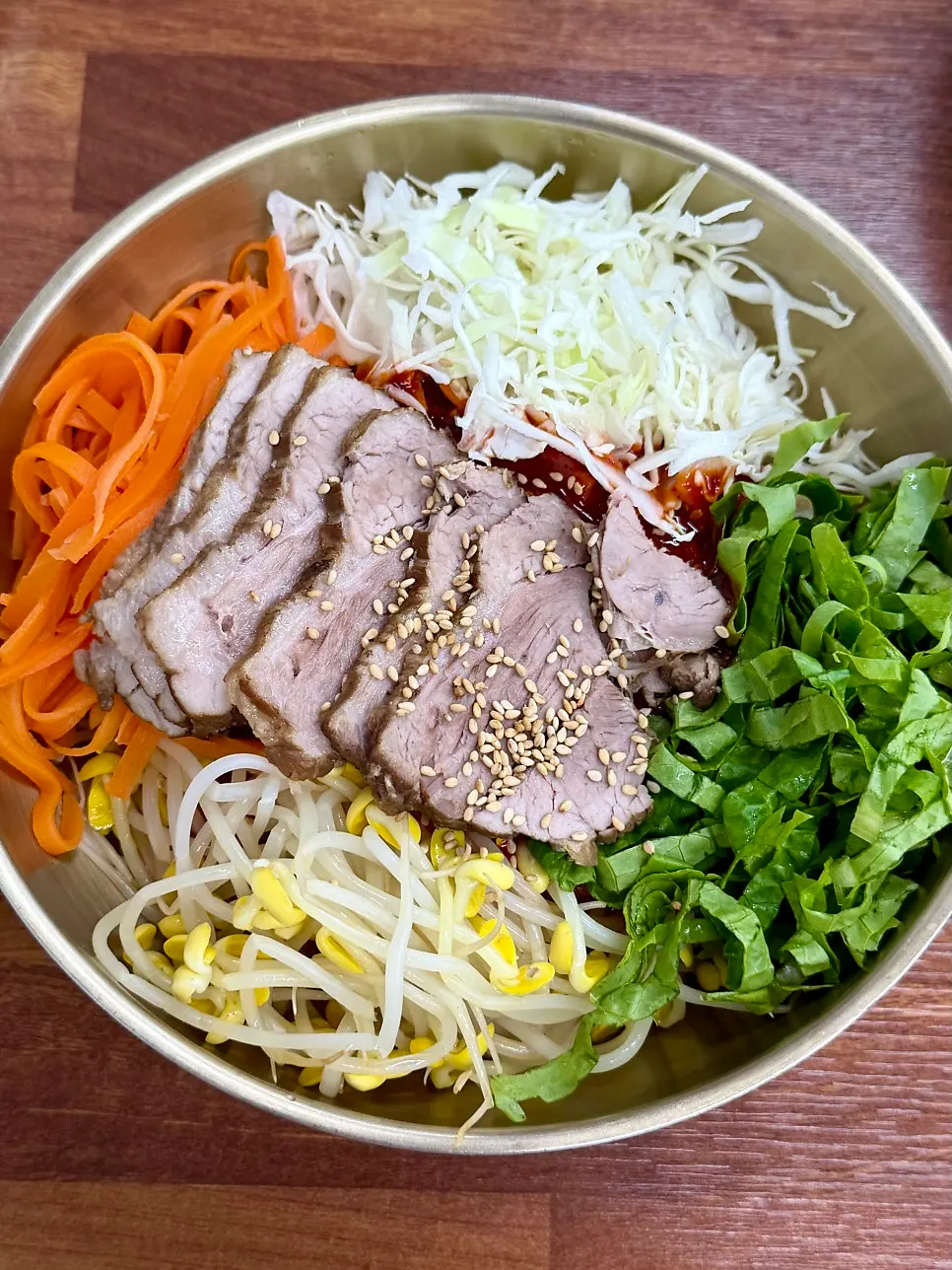 Spicy and tangy pork bibim guksu