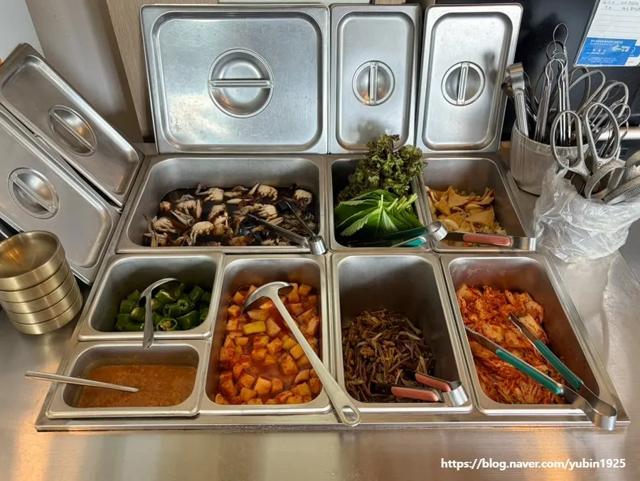 Side dishes and soy-marinated crab at the self-serve bar