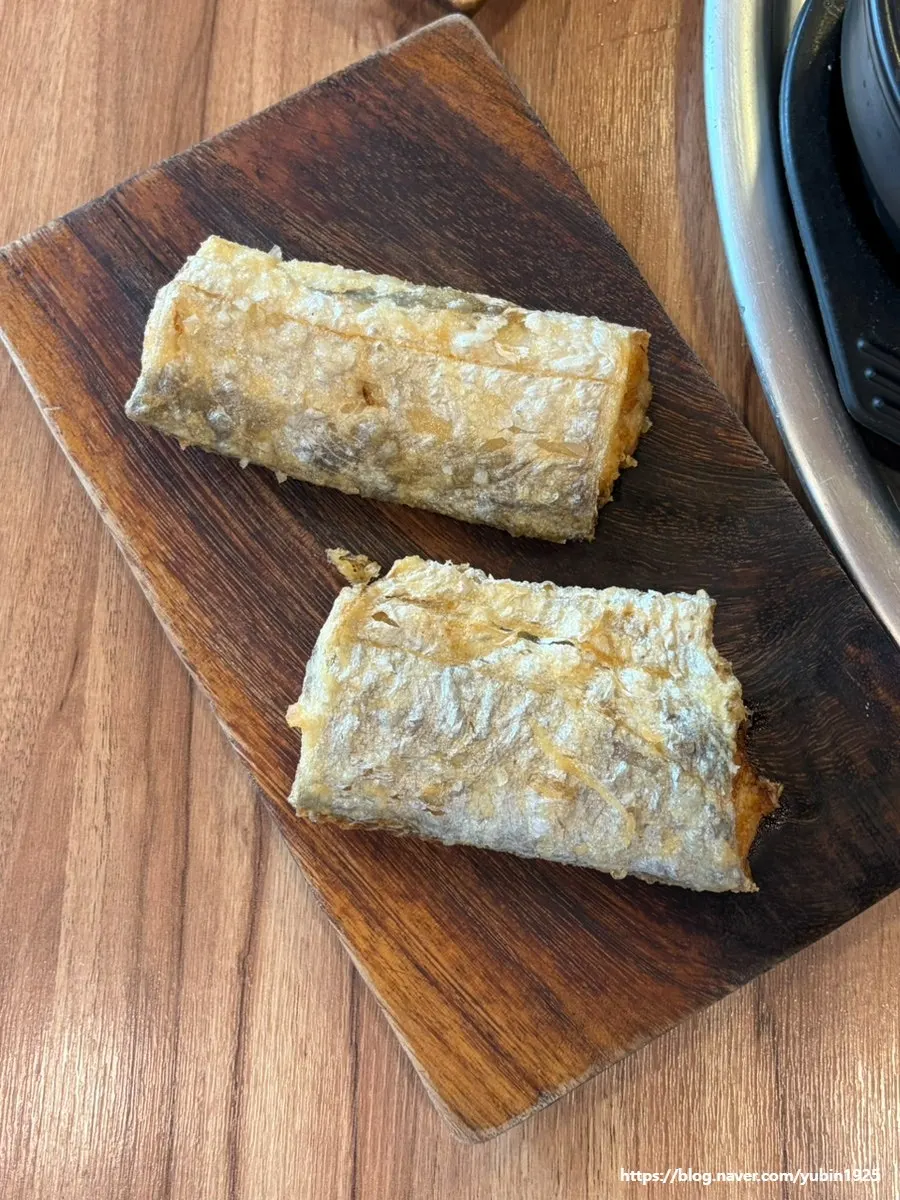Dombegogi wrapped with scallion salad