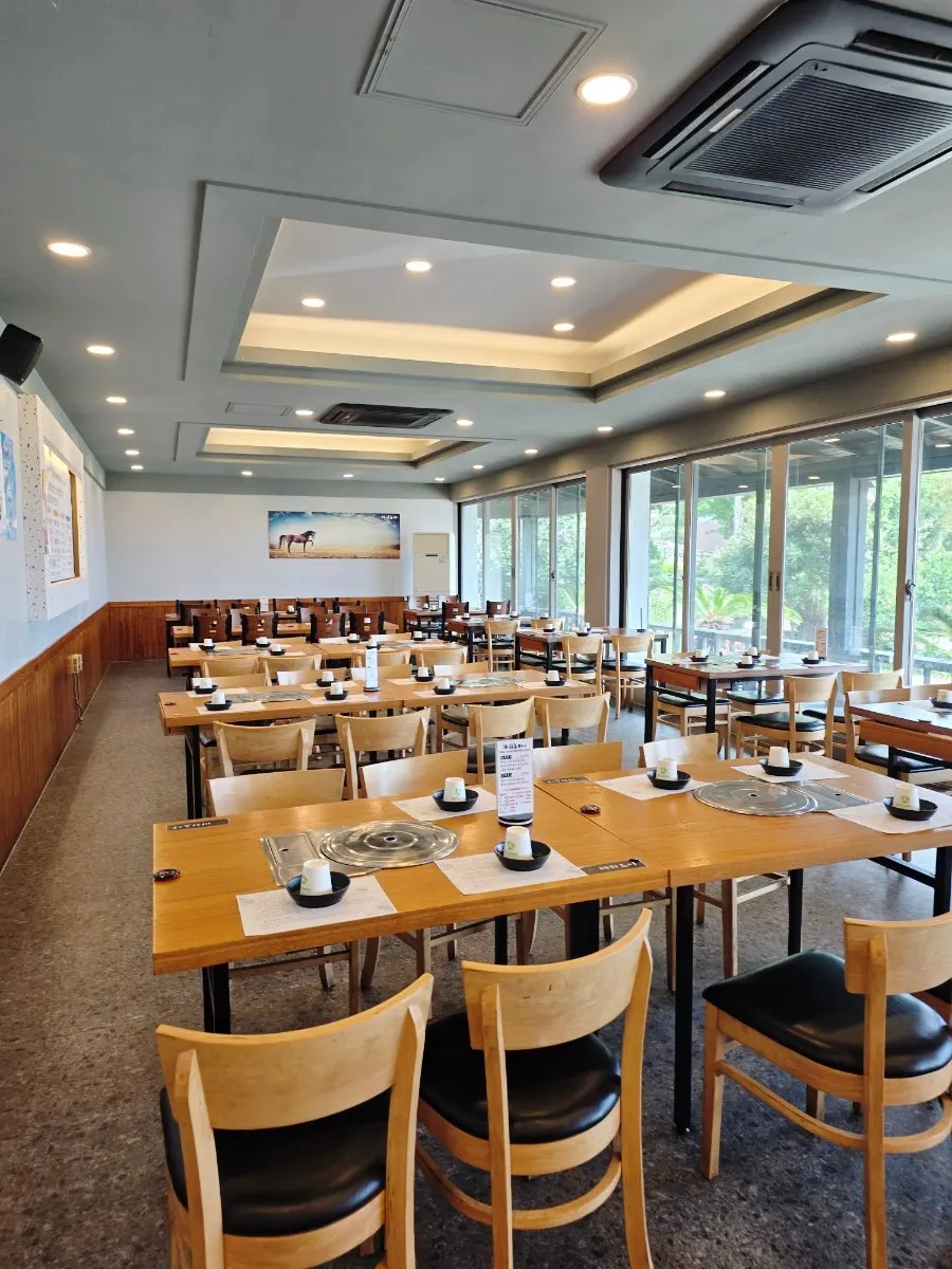 Private room-style seating with a high chair