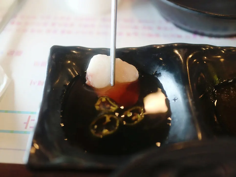 Horse sashimi plated with flower decorations