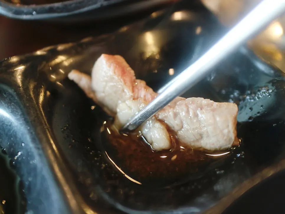 Grilled horse meat with fat and lean cuts