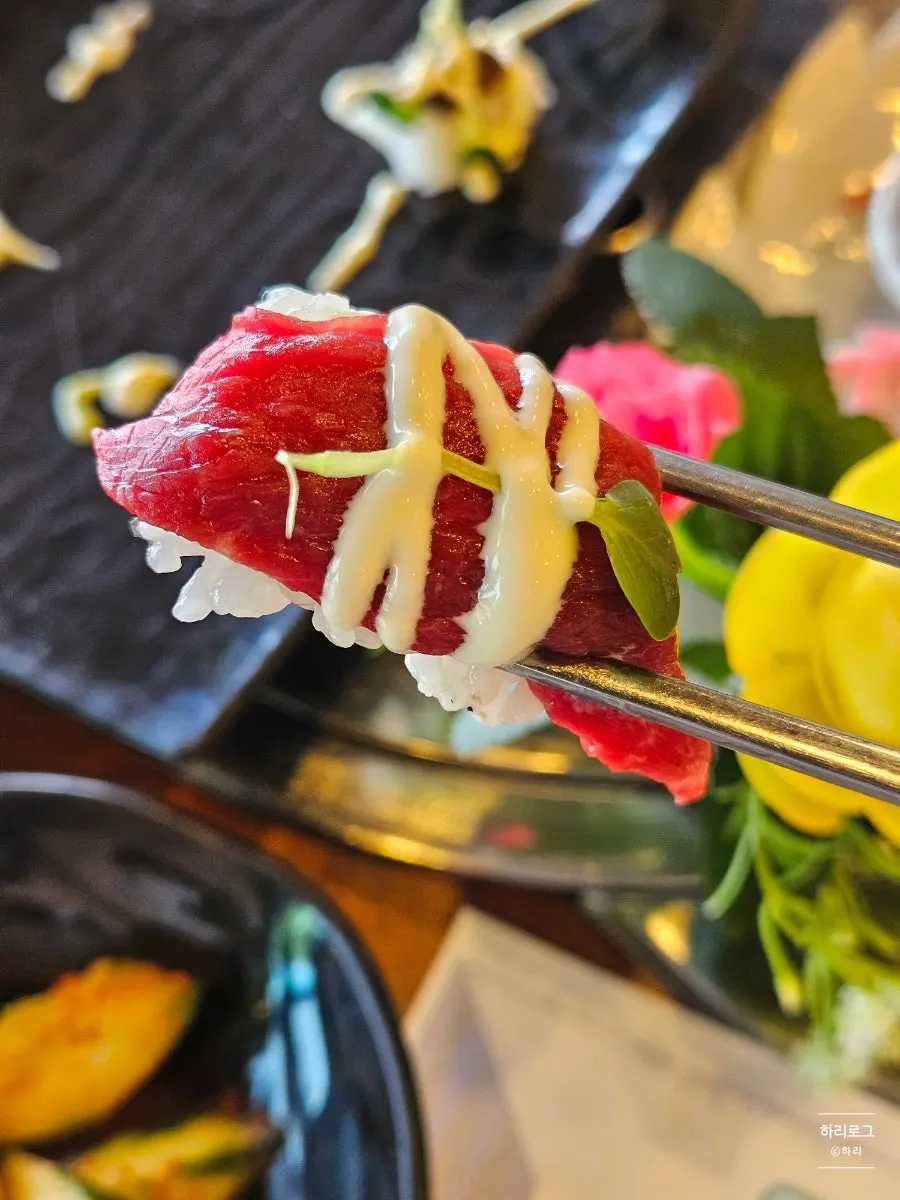 Course served with horse-meat sushi