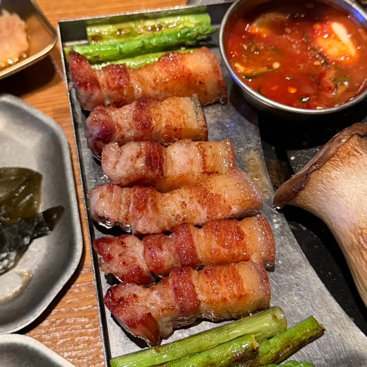 Black pork table spread at Jeju Monteurak Bundang Sunae Branch
