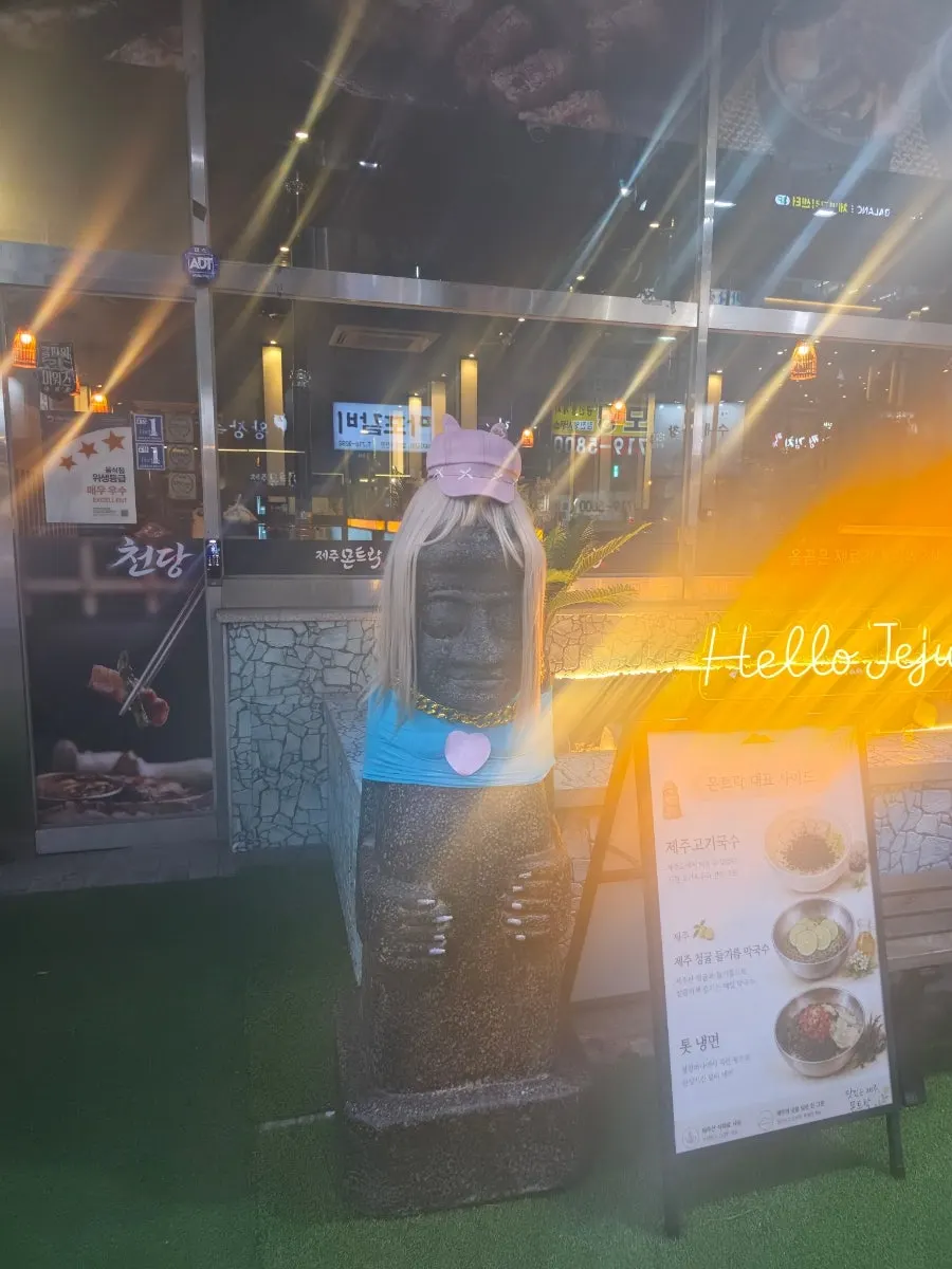 Stone dol hareubang statue placed in front of the restaurant
