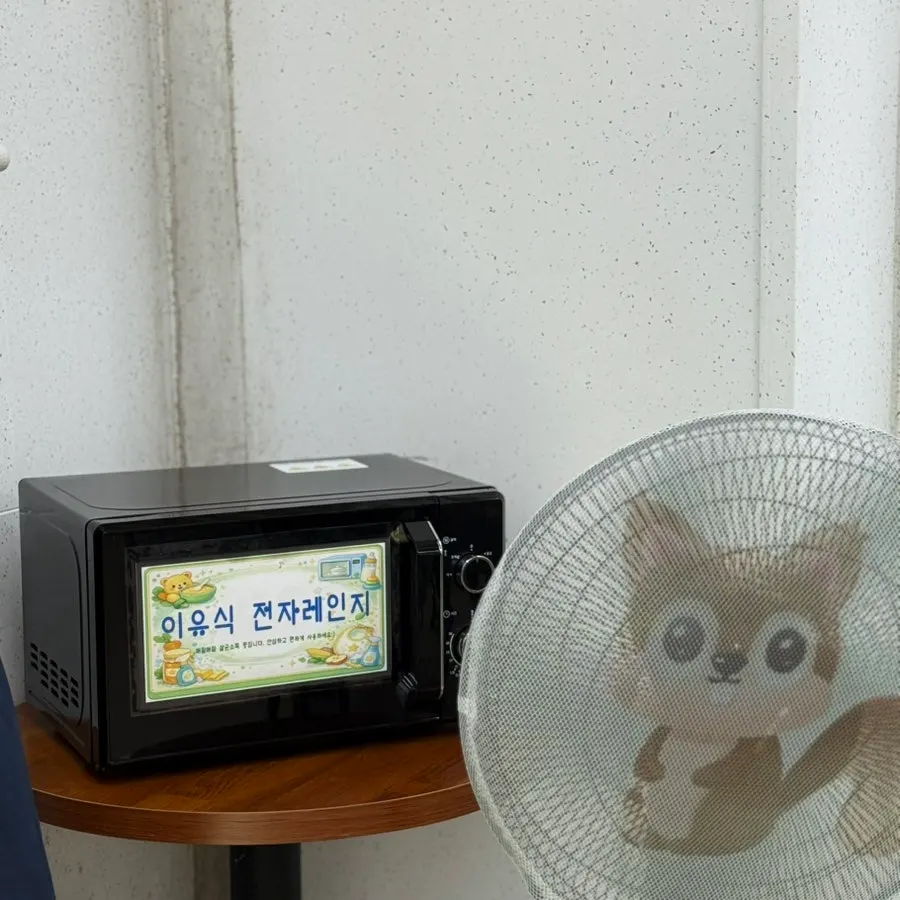 Amenity corner with a baby chair and microwave