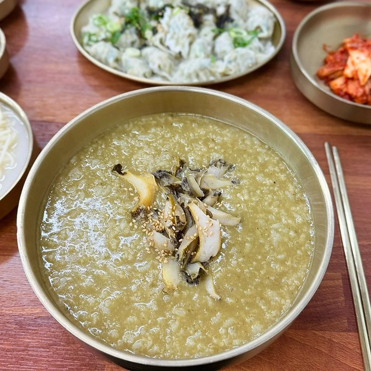Myeonjumak's abalone porridge topped generously with abalone meat