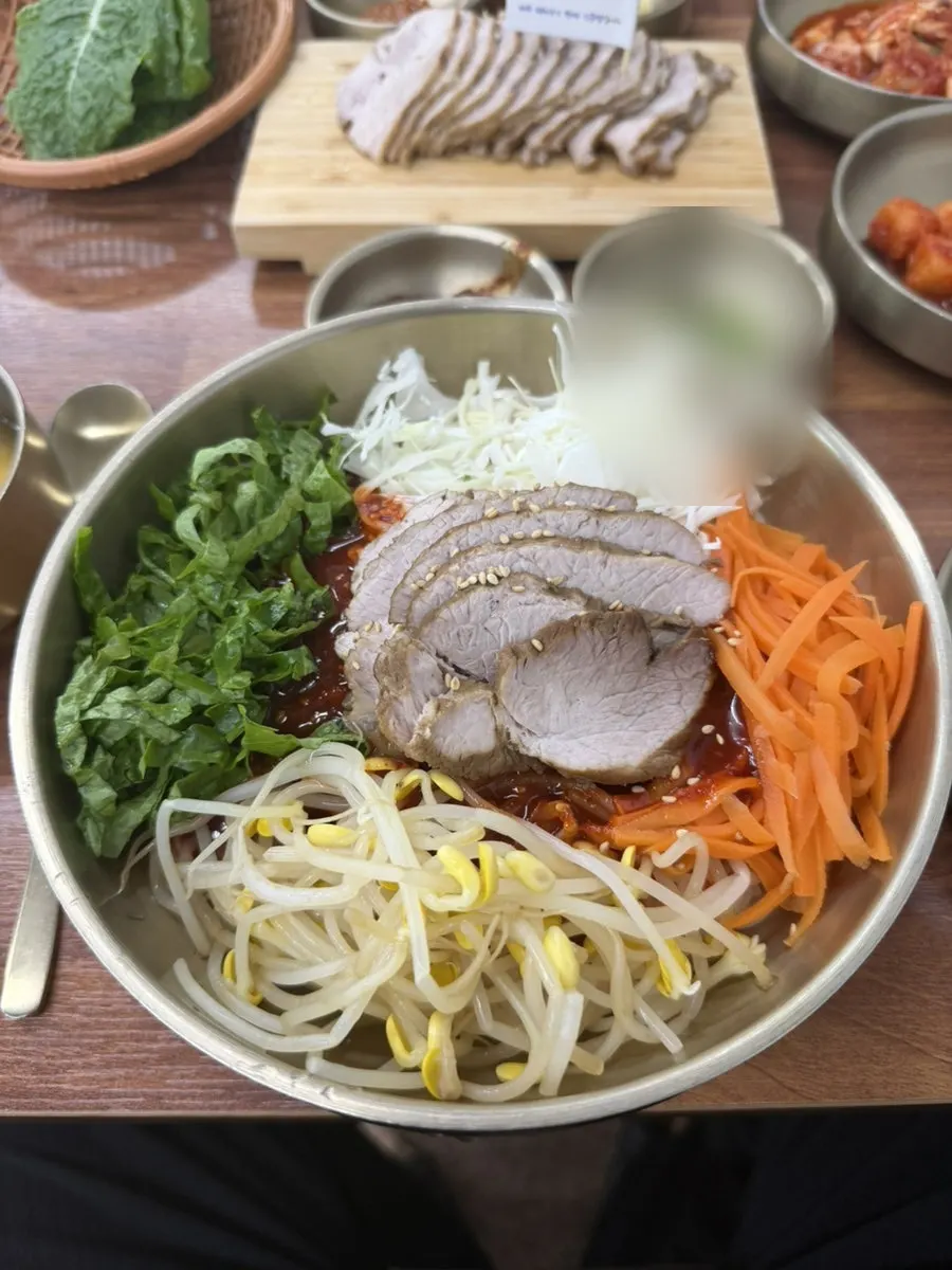 Full meal spread of pork noodles and dombe pork