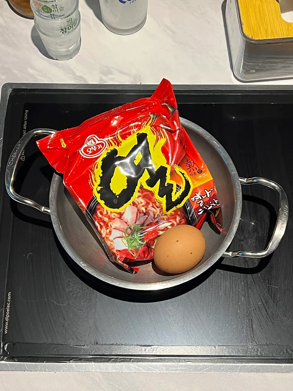 Yeolramyeon and raw egg included as a basic snack
