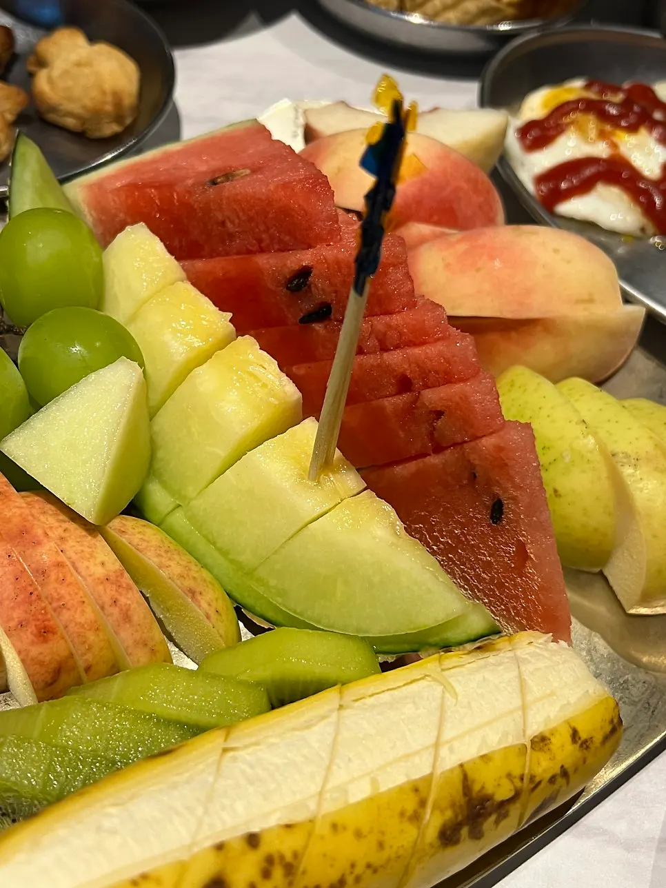 Fruit platter with watermelon, melon and shine muscat grapes