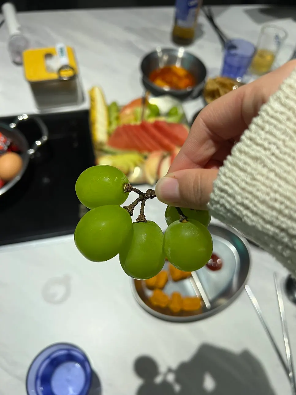 Fruit snack and drink glasses on the table