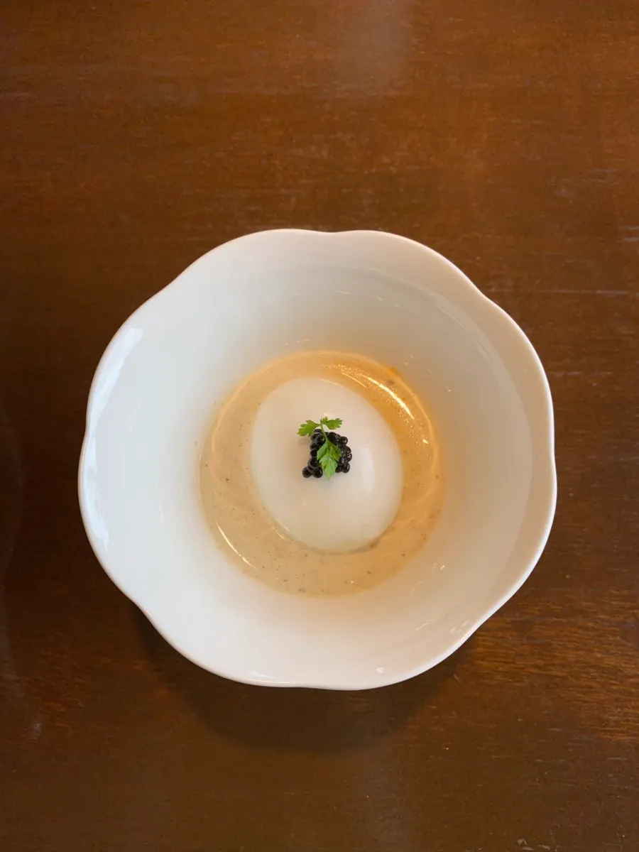 Soft-boiled egg dish topped with caviar