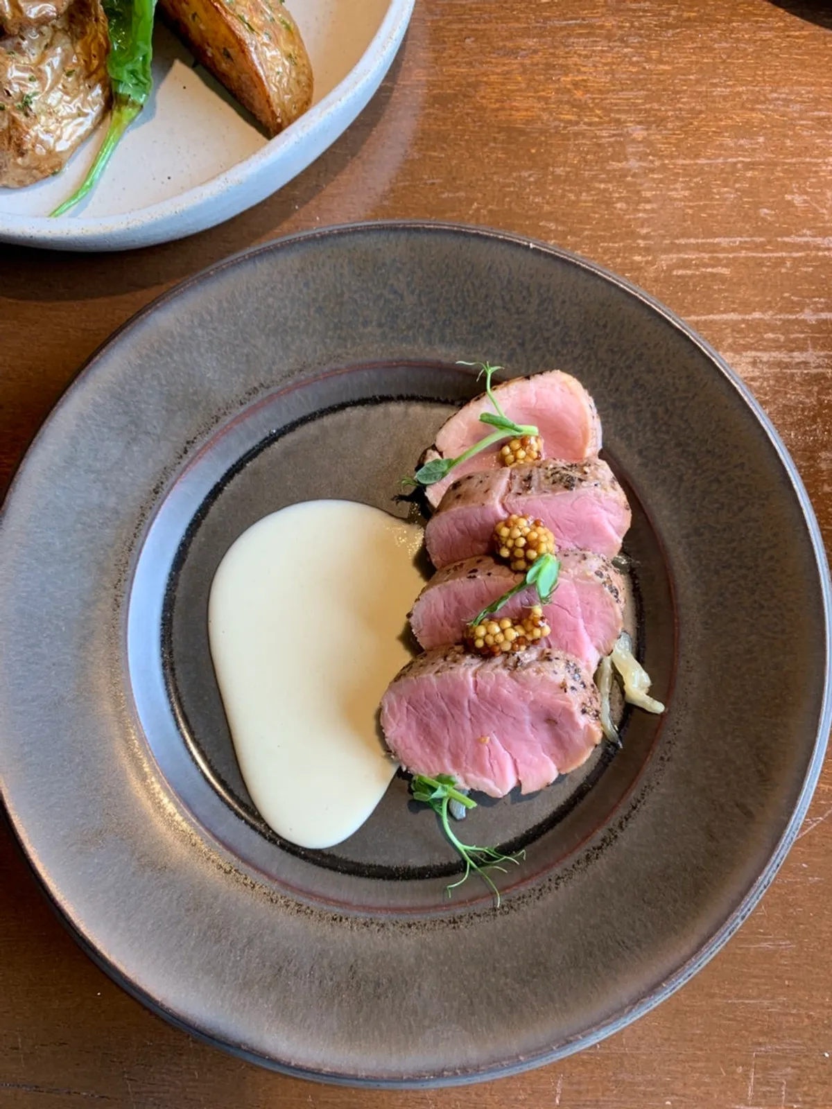 Jeju black pork tenderloin with fermented anchovy cream sauce