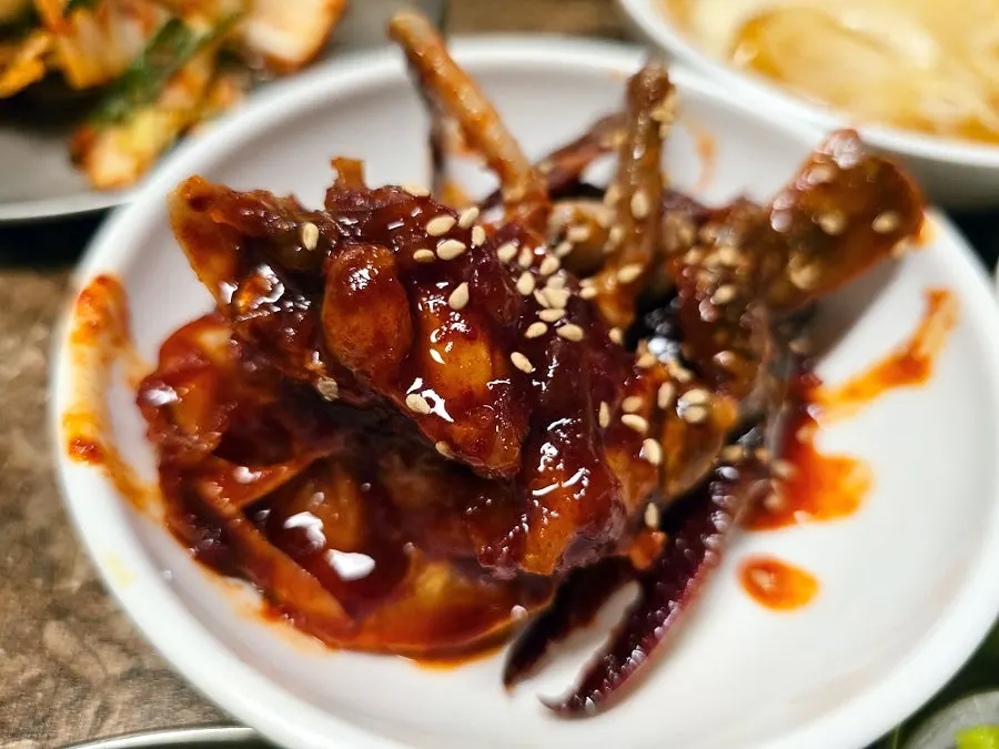 Seasoned raw crab and fresh cabbage kimchi side dishes