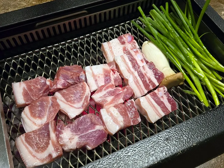 Staff grilling Nanchukmatdon as part of the service