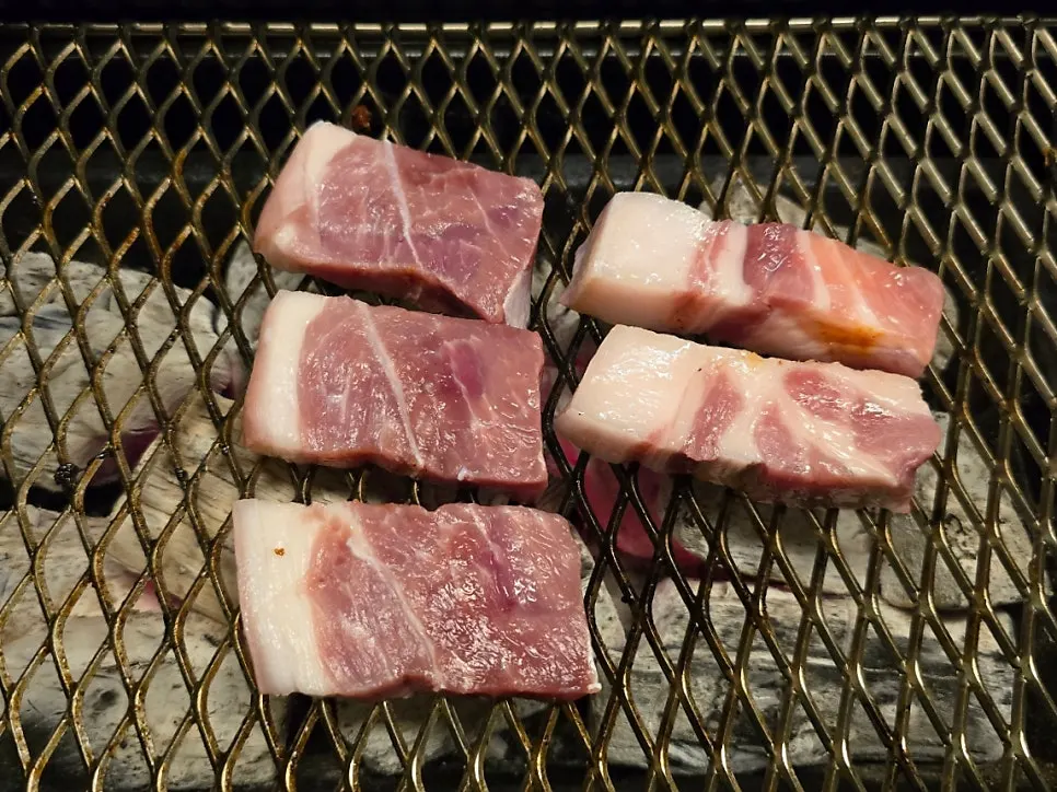 Black pork dipped in mel-jorim with scallions
