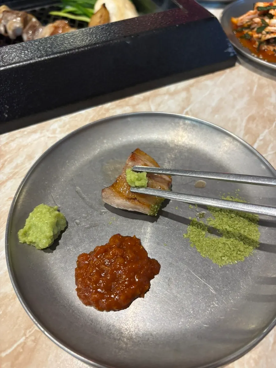 Black pork dipped in matcha salt