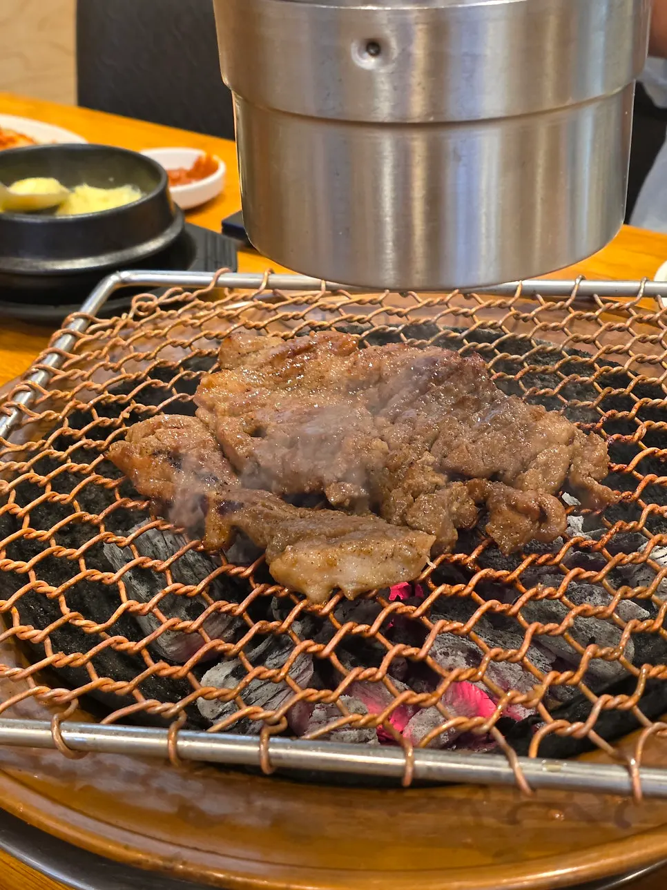 Signature marinated pork ribs on the charcoal grill