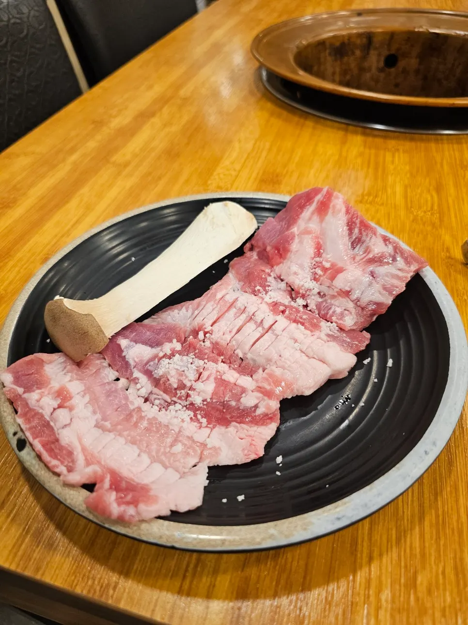 Meat placed on the charcoal grill