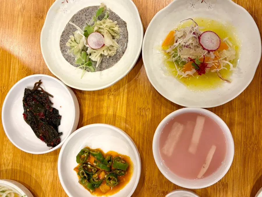 Generous spread of side dishes on the table