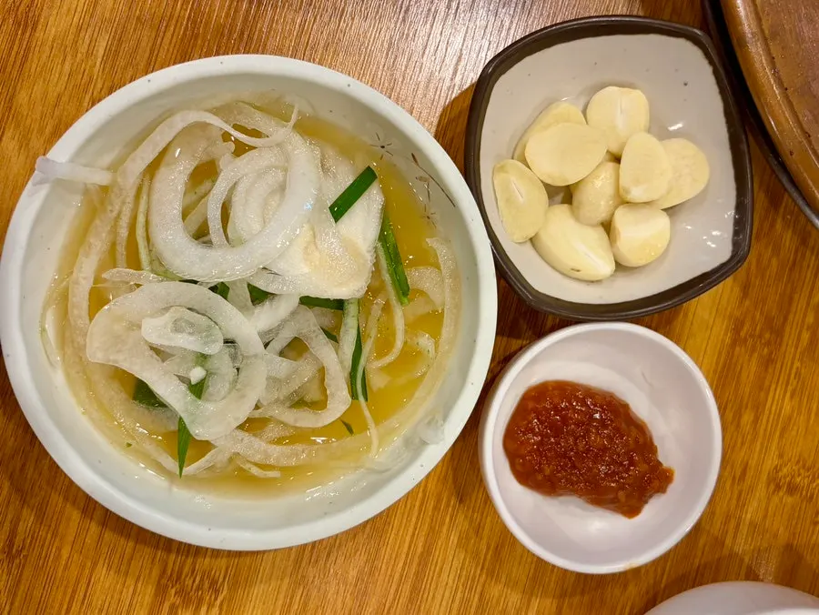Scallion salad and pickled onion side dishes