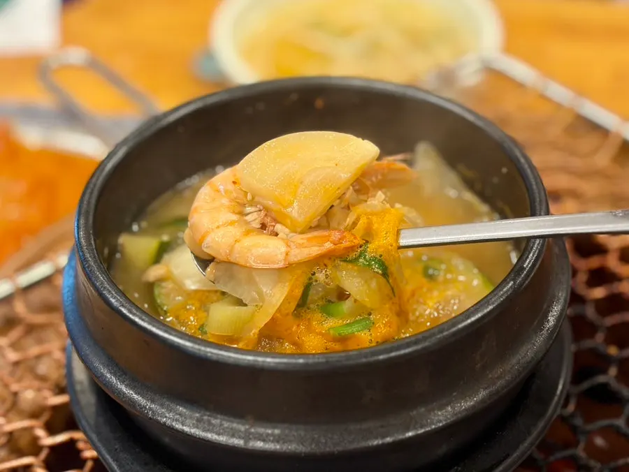 Seafood doenjang jjigae with shrimp and blue crab