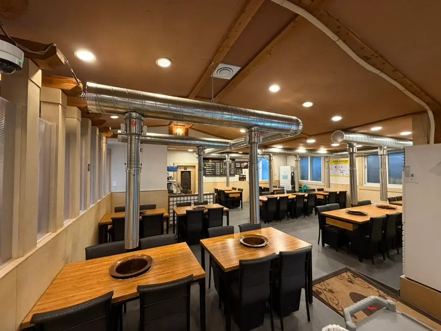 Dining area inside Jeju Boncham Sutbul Galbi