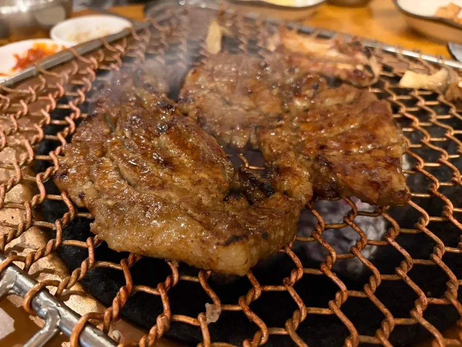 Marinated pork ribs grilled over true charcoal