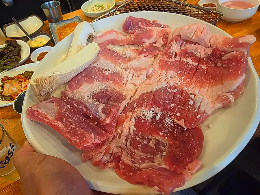 Charcoal-grilled meat turning golden