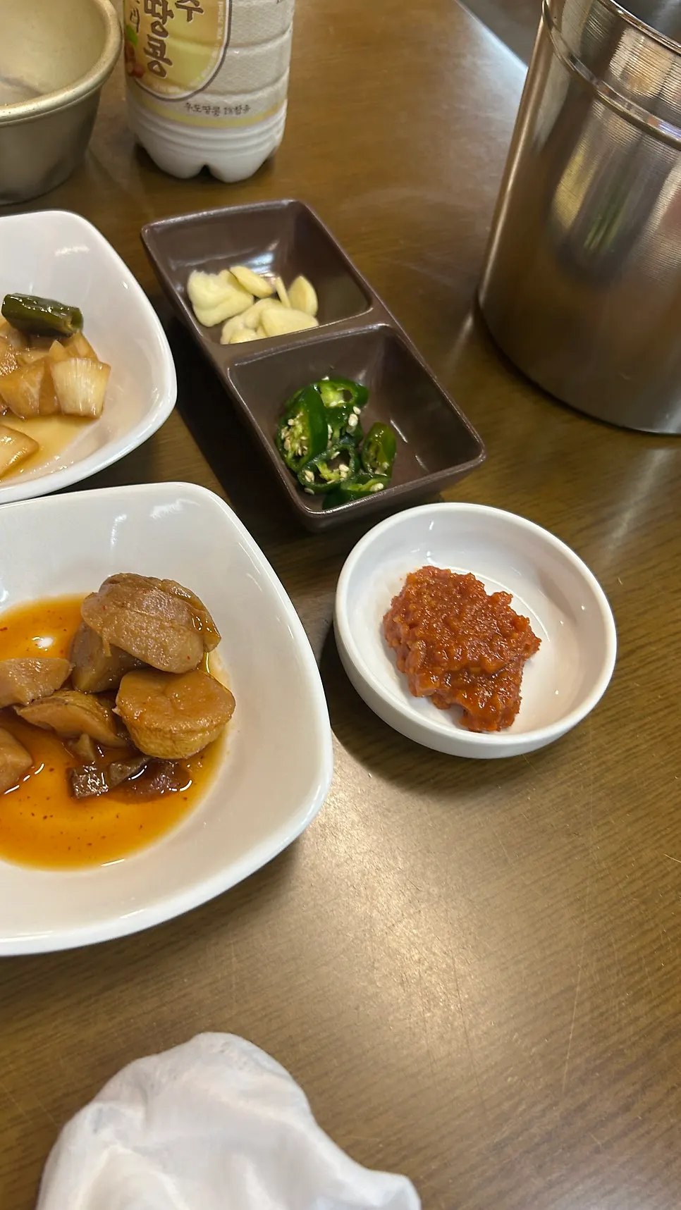 Table set with side dishes and wrap greens